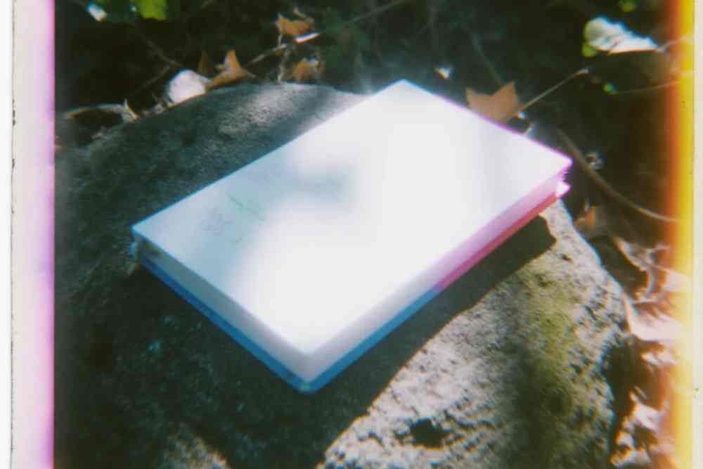 Cuaderno de campo con anotaciones sobre acciones de voluntariado en Sucamiño.